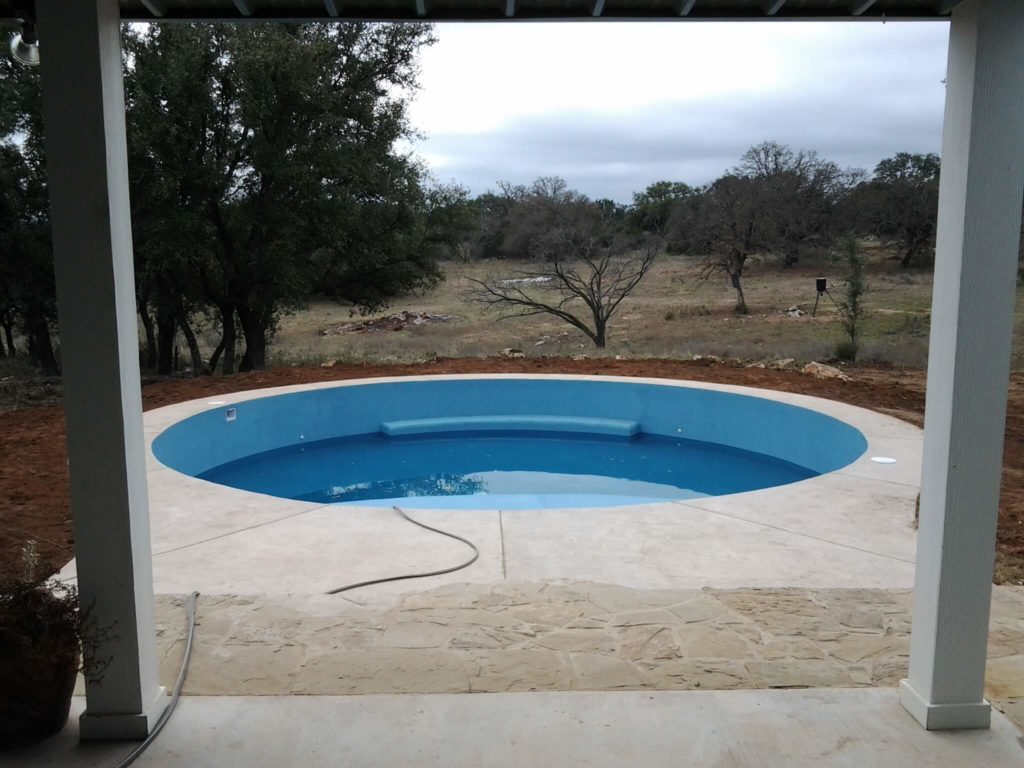 A pool made from a stock tank.