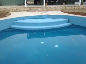 A pool made from a stock tank.
